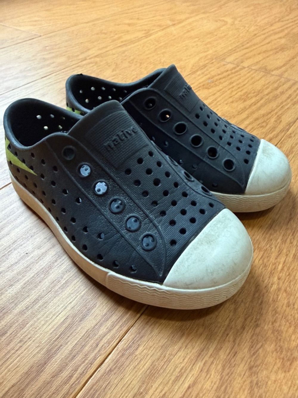 Native Slip-On Sneakers in Navy with Lime Lightening Bolt